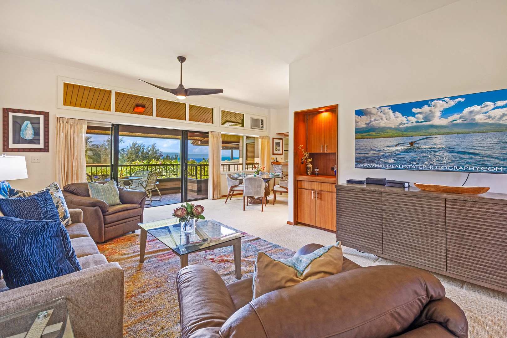 Lahaina Vacation Rentals, Kapalua Ridge 2321 - Relax in this cozy living space with comfortable seating, beautiful natural light, and stunning views of the outdoors