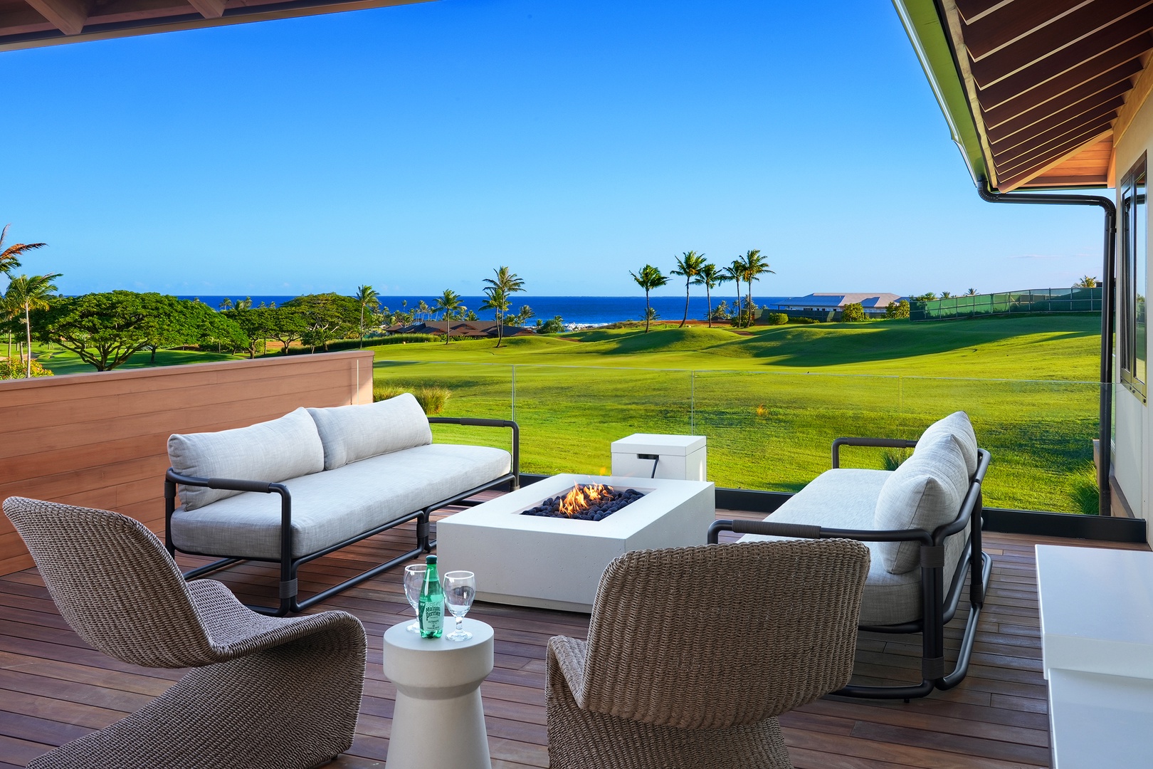 Koloa Vacation Rentals, Hale Hanohano - Ocean and golf course views from the upper lanai lounge.