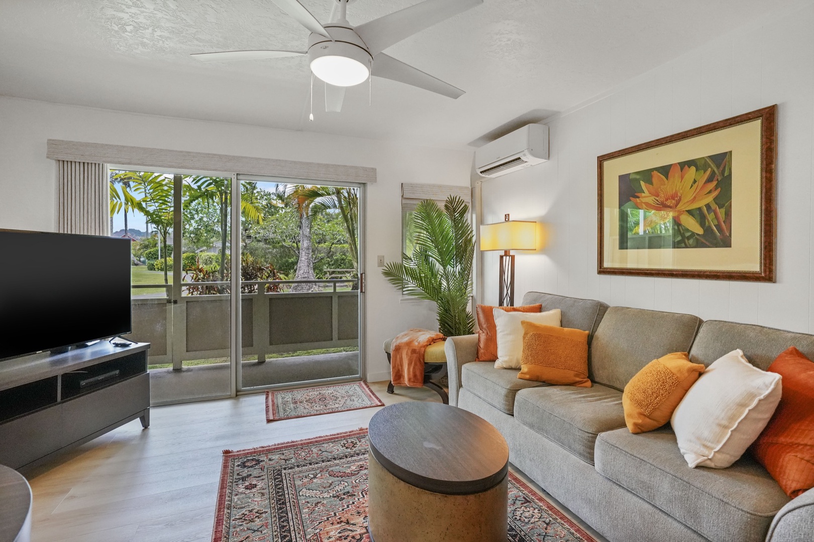 Kapaa Vacation Rentals, Kahaki Hale - The recently updated living space features modern decor and split unit AC with comfortable seating and tropical design.