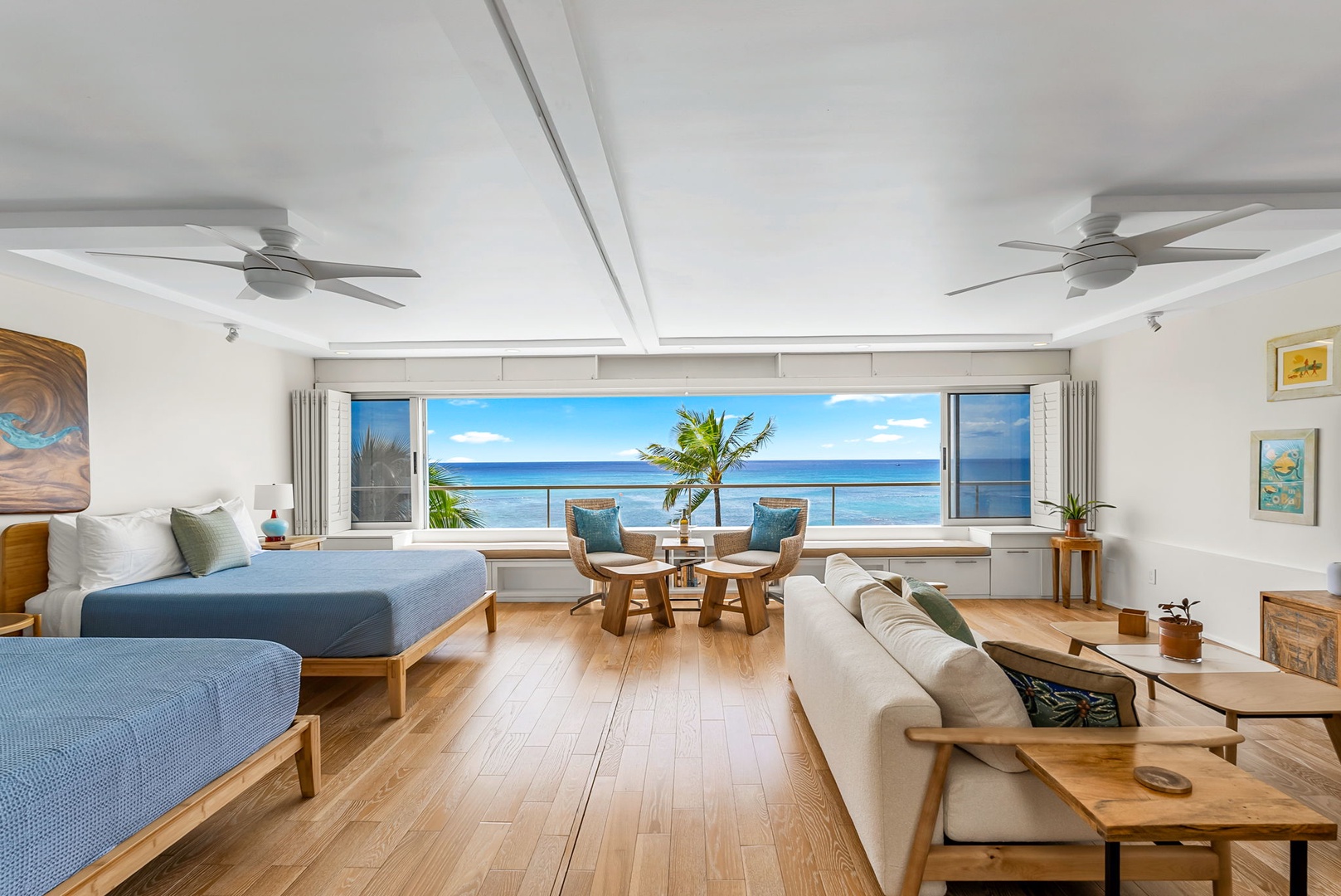 Honolulu Vacation Rentals, Colony Surf Luxe - Oceanview living and sleeping space with king-size bed and full sofa sleeper, perfect for relaxing and taking in the view.