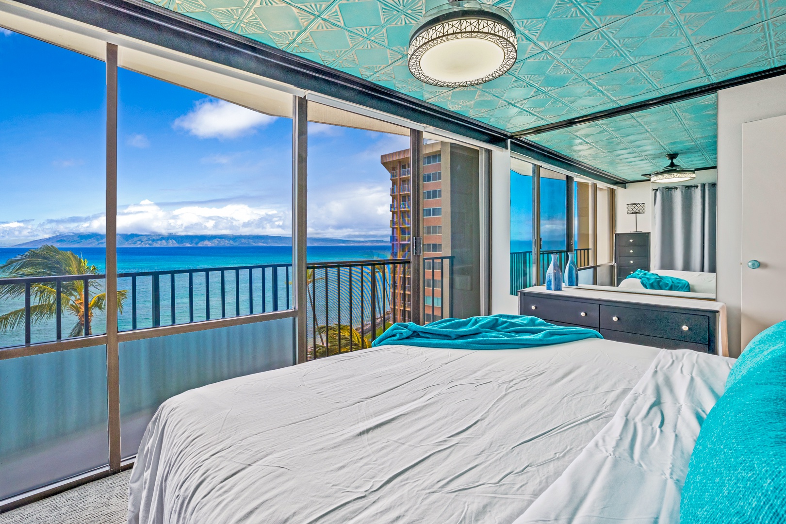 Lahaina Vacation Rentals, Valley Isle 804 - Wake up to breathtaking ocean views from the comfort of your bed. The floor-to-ceiling windows make for a serene and relaxing stay