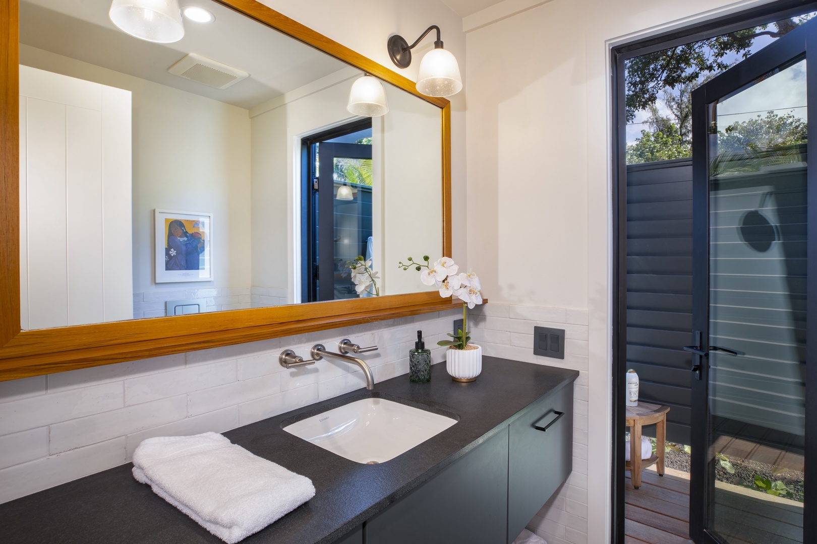 Kamuela Vacation Rentals, Hui Pu - Bright vanity area with a large mirror and an adjacent outdoor view for a unique touch.