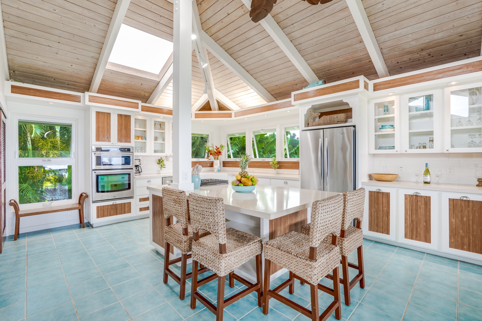 Princeville Vacation Rentals, Wai Lani - Cook, dine, and revel under the expansive vaulted ceilings of our open-concept kitchen and dining area.