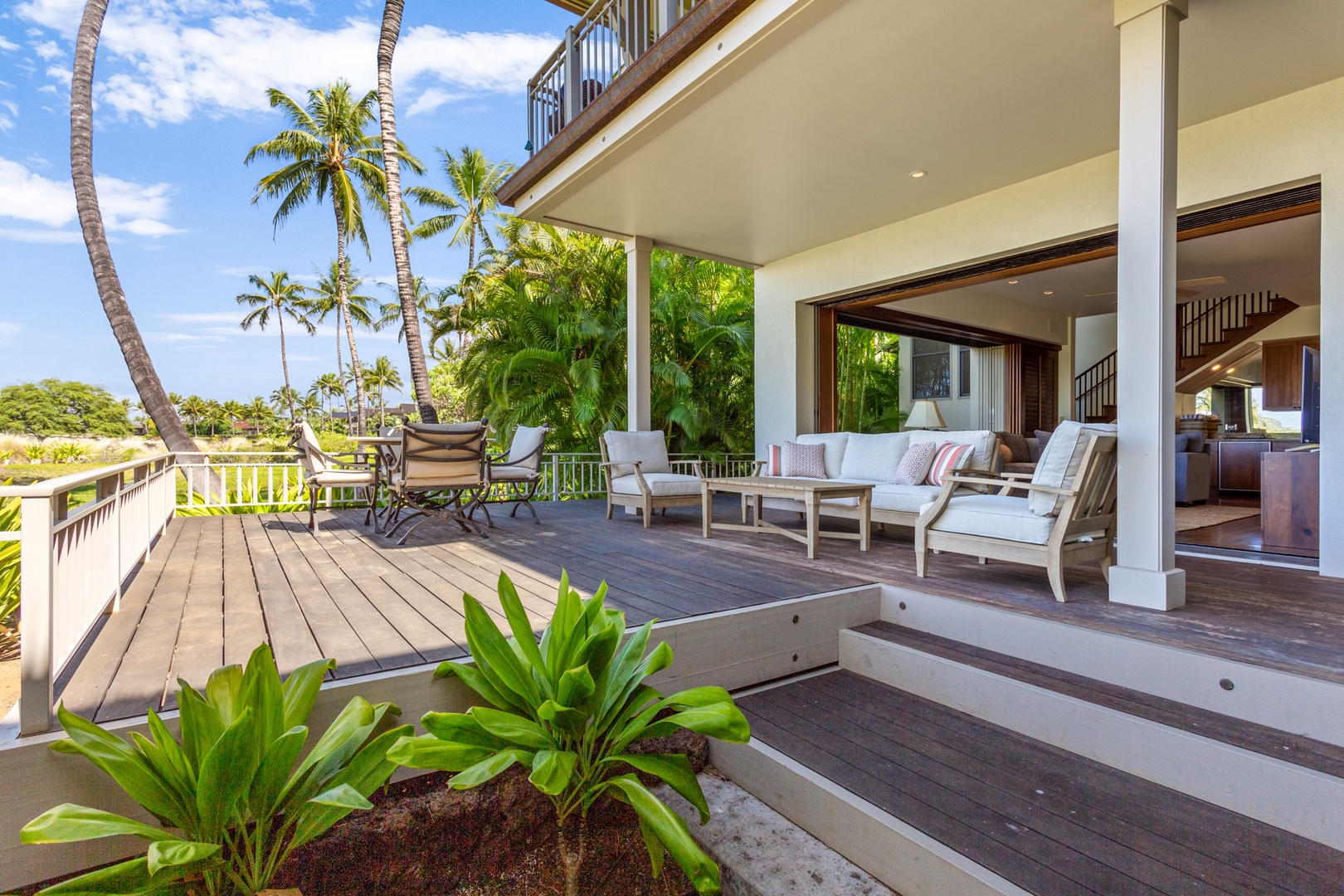 Kailua Kona Vacation Rentals, OFB 3BD Ka'Ulu Villa (129D) at Four Seasons Resort at Hualalai - Third lower deck angle with view into downstairs “bonus living room”.