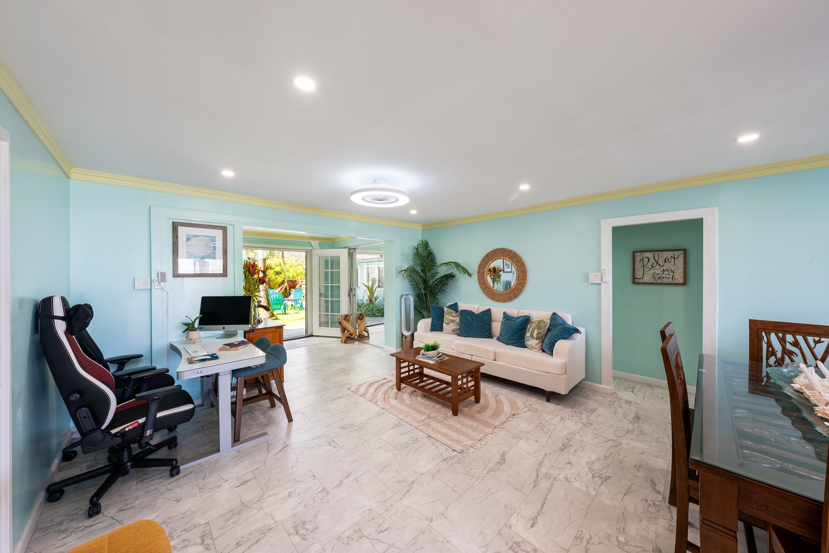Hauula Vacation Rentals, Private Beach Paradise - Bright, airy living space with calming coastal tones and a relaxed island feel.