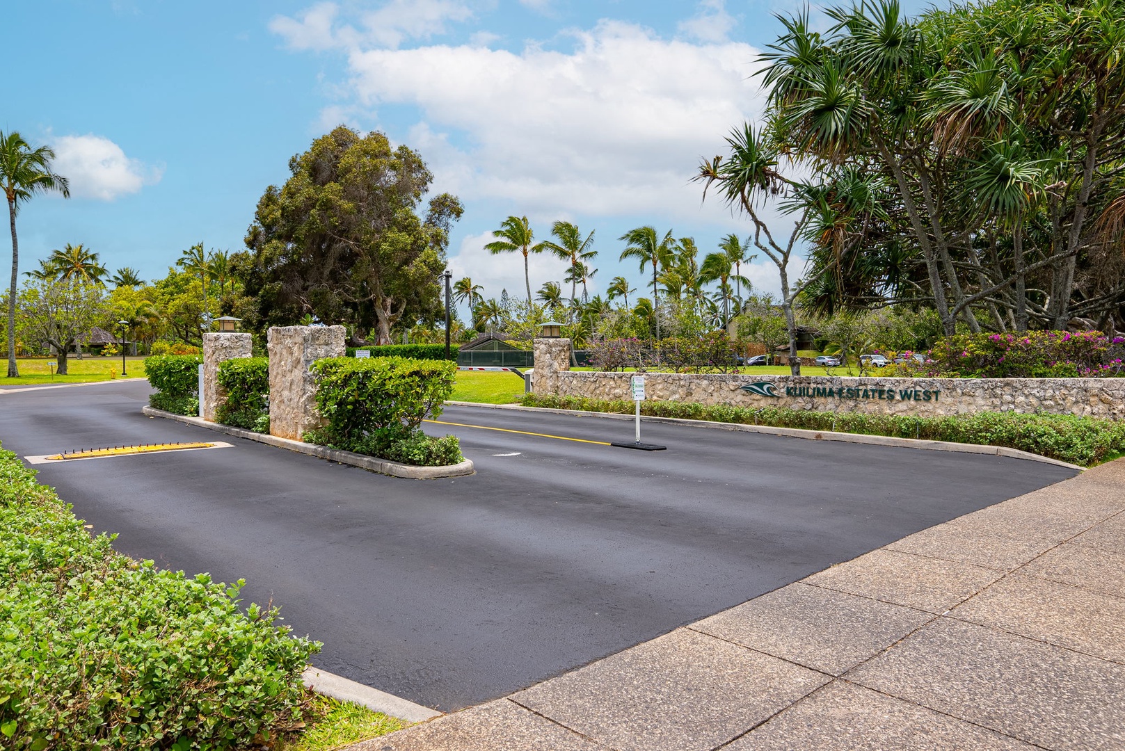 Kahuku Vacation Rentals, Kuilima Estates West #120 - Entry gate to Kuilima Estates West