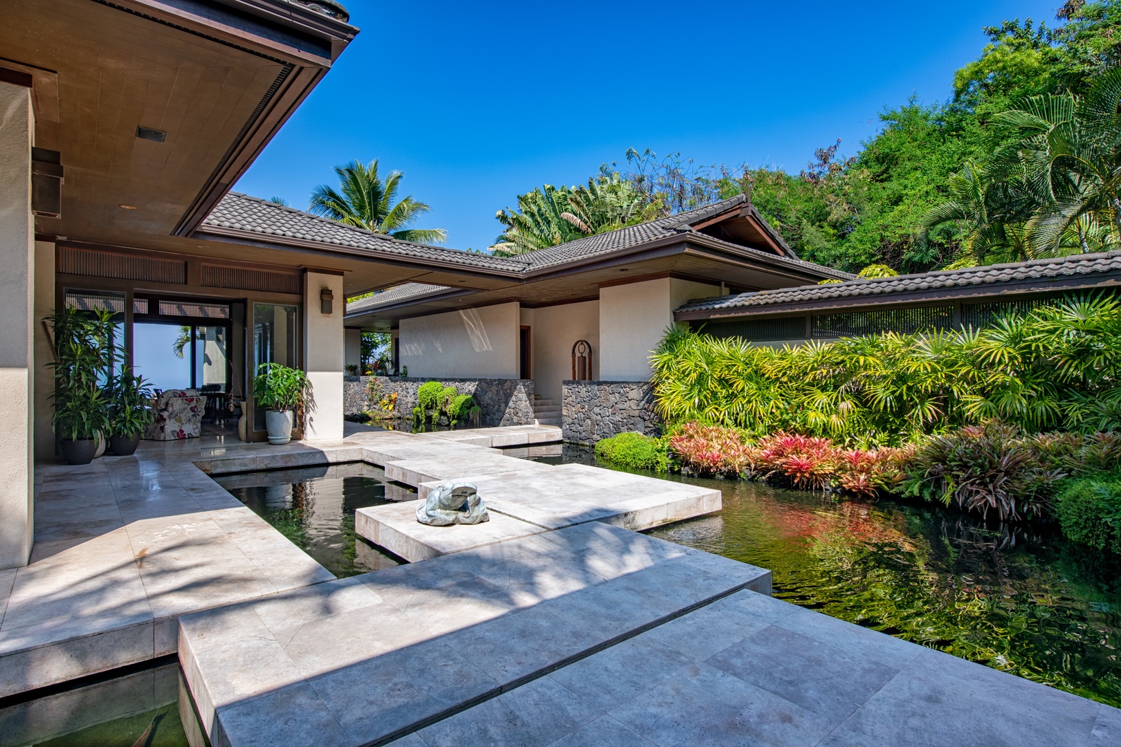 Kailua Kona Vacation Rentals, Hale Wailele** - French Limestone walkways connect each pavilion