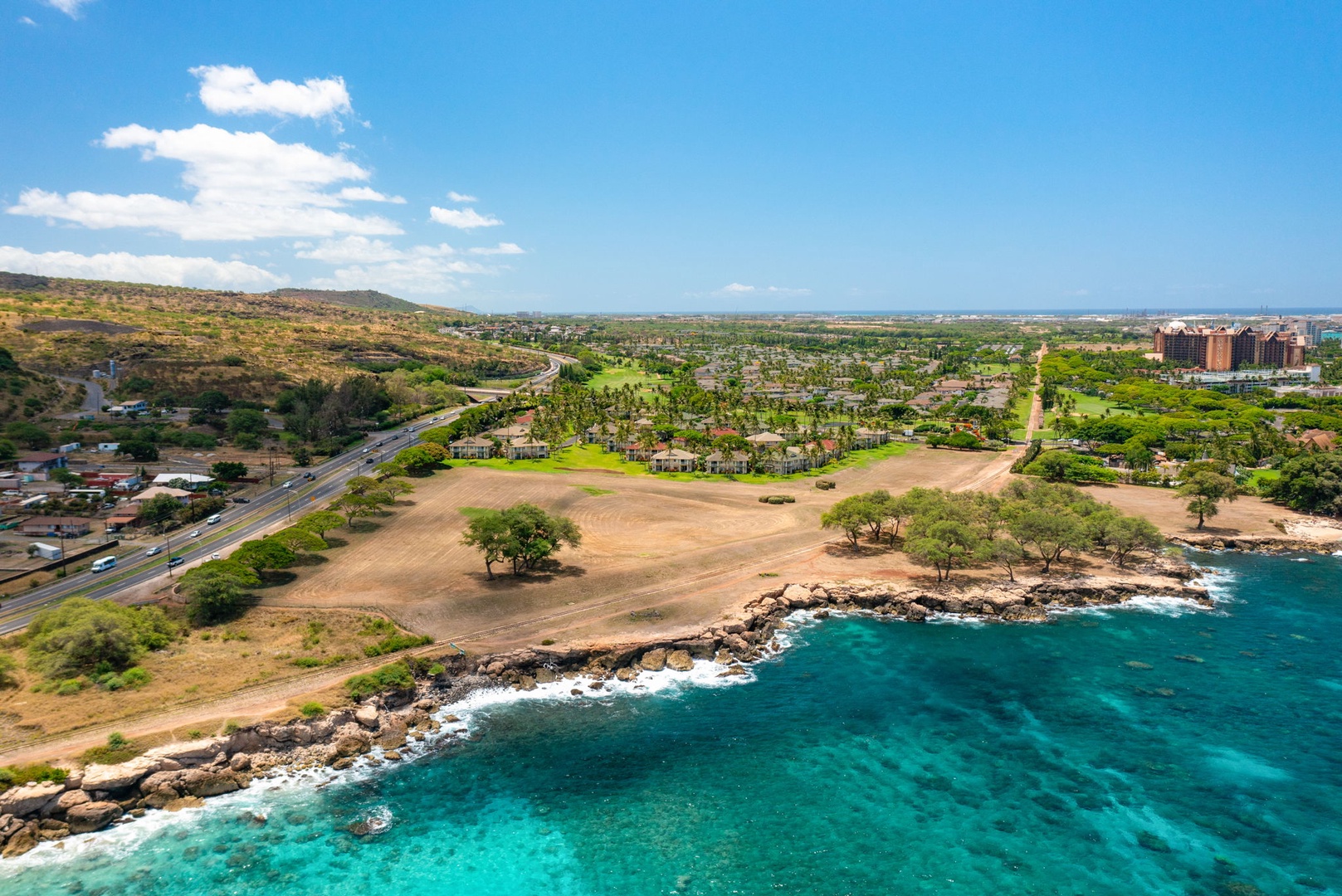 Kapolei Vacation Rentals, Kai Lani Luxury 6D - Coastal view showcasing the nearby sandy beach and turquoise waters, perfect for a day of relaxation or adventure.