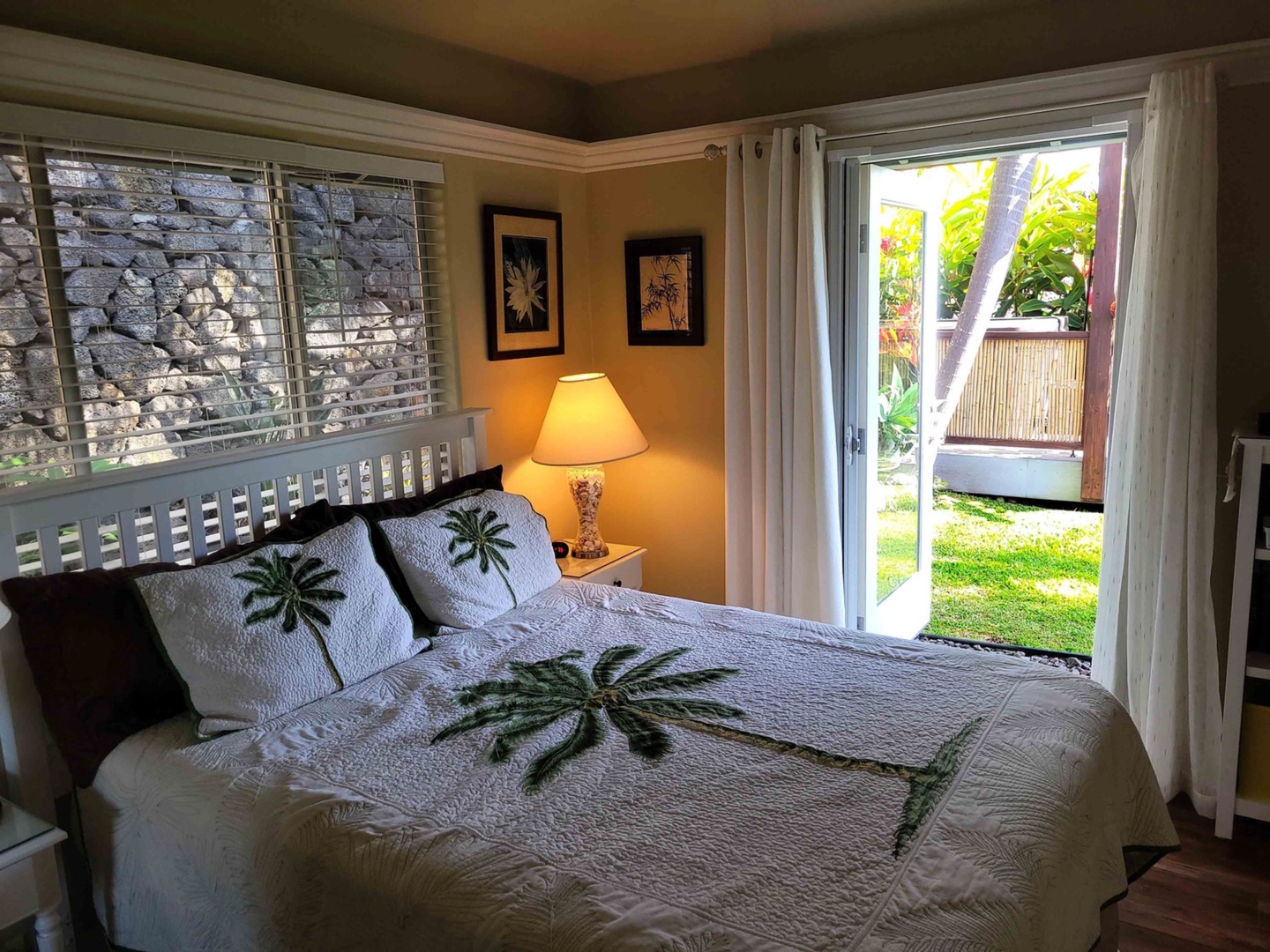 Kailua Kona Vacation Rentals, Hale Alaula - Ocean View - The second bedroom is furnished with a cozy queen-size bed, an overhead fan, 32-inch wall-mounted Smart T.V. with a Blu-Ray player, and a large closet.
