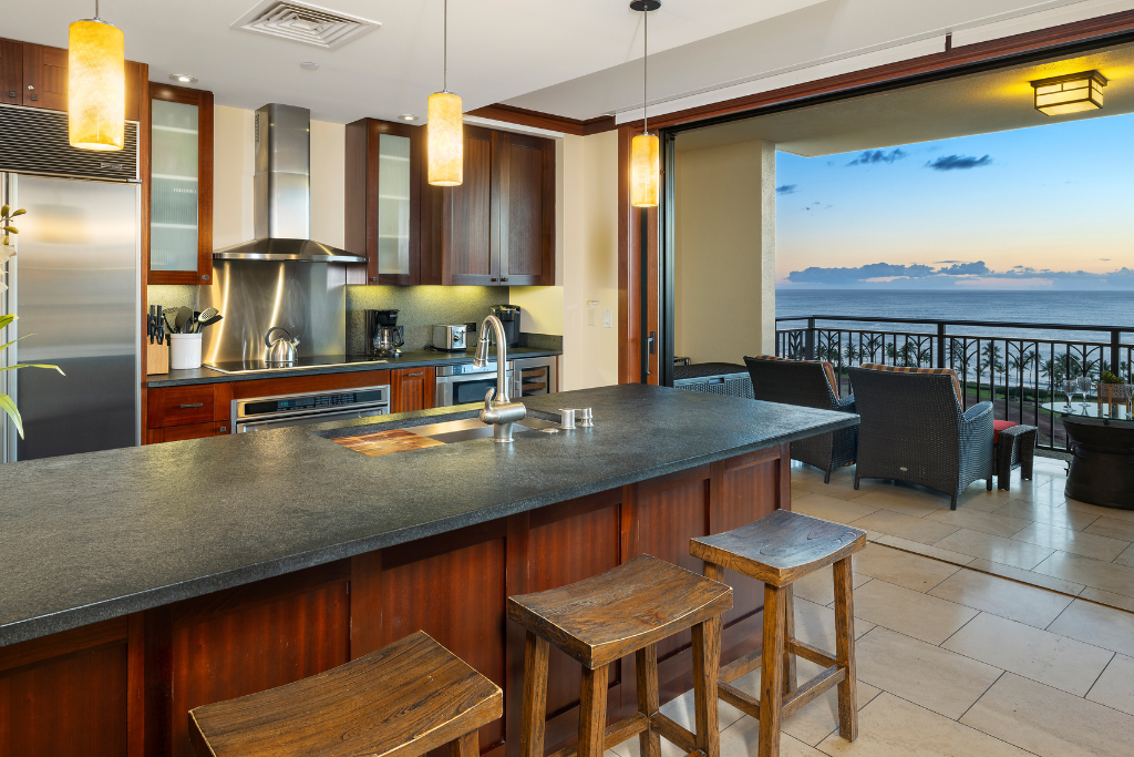 Kapolei Vacation Rentals, Ko Olina Beach Villas O1404 - Kitchen with a view—enjoy culinary creations while overlooking the scenic outdoors.