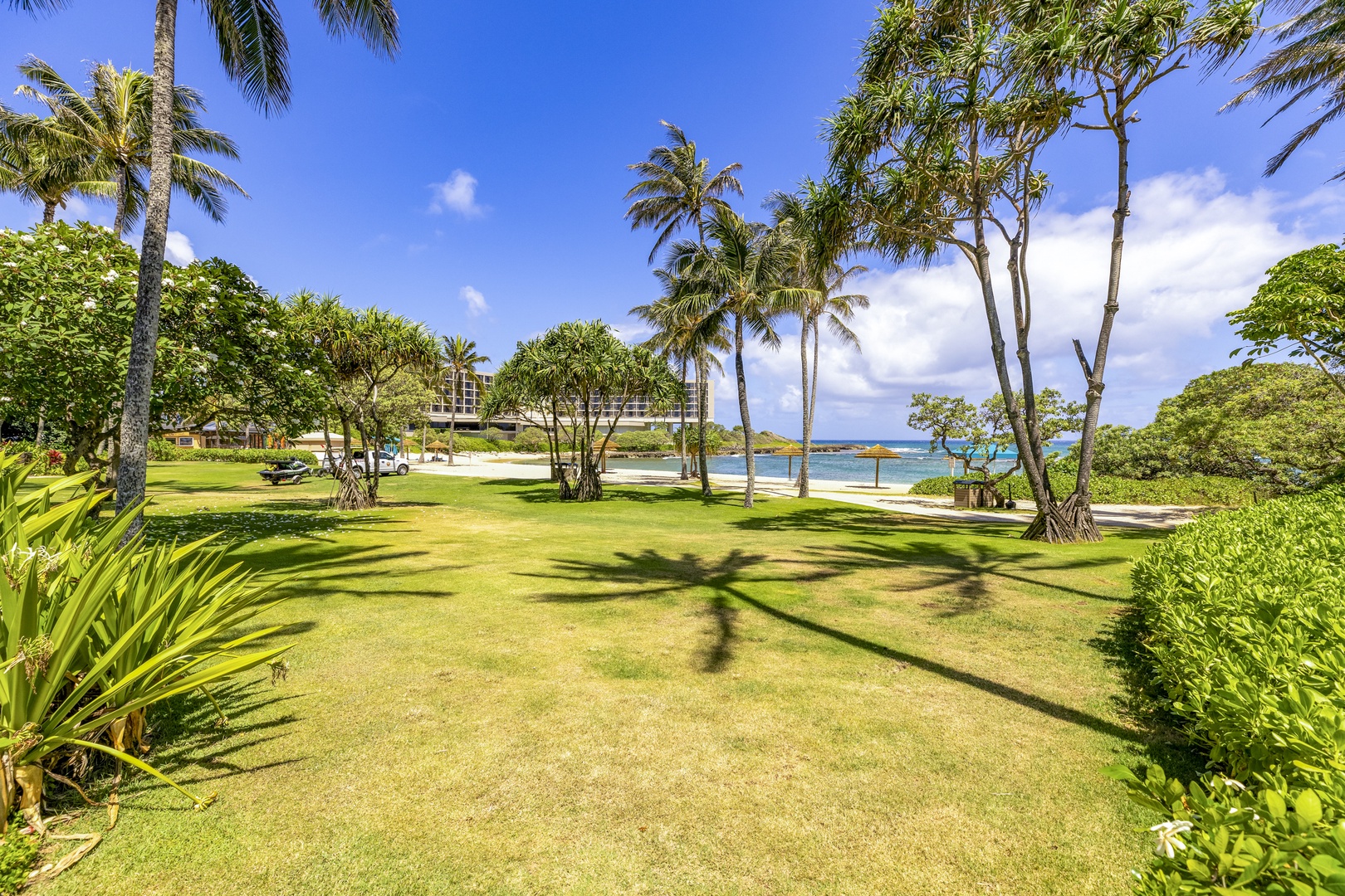 Kahuku Vacation Rentals, Turtle Bay Villas 201 - Beach lawn fronting Ocean Villas