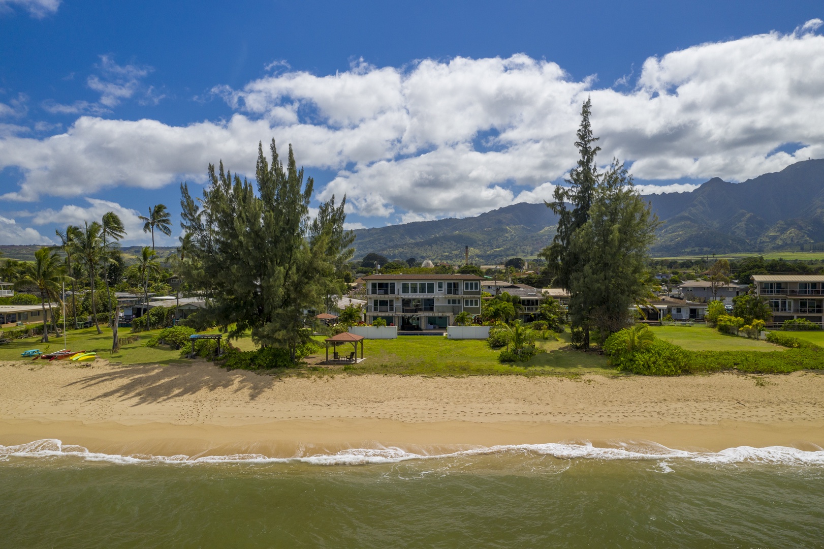 Waialua Vacation Rentals, Waialua Beachfront Estate - A short drive from the home leads to attractions like the Waimea Valley hike/Waimea Falls, Dole Plantation, a renowned luau at the Polynesian Cultural Center, and golf at Turtle Bay Resort