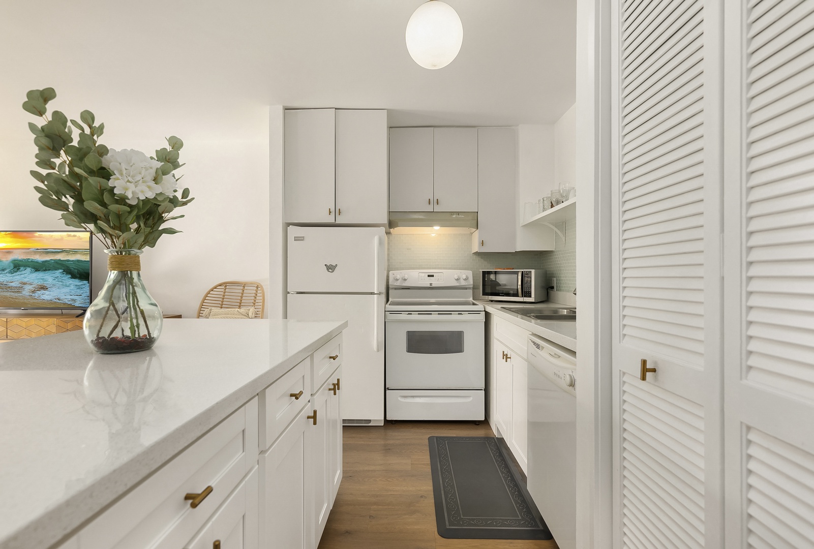 Kahuku Vacation Rentals, Pulelehua Kuilima Estates West #142 - Appliances all in white for a clean, modern look