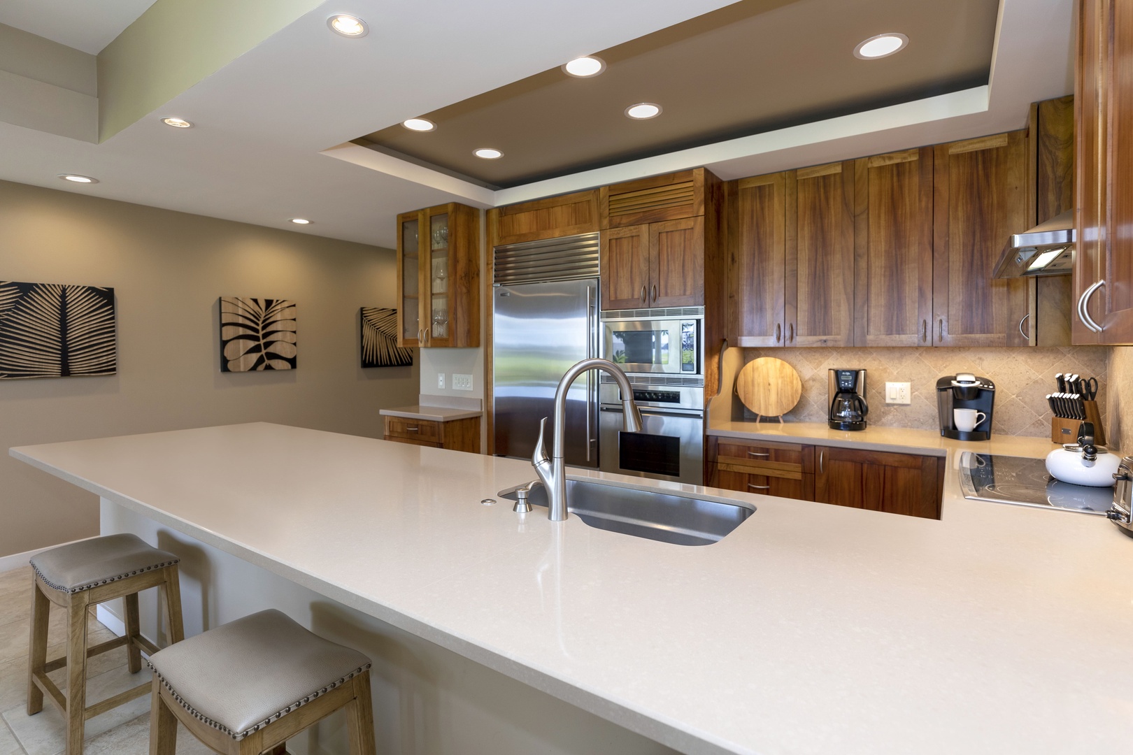 Kamuela Vacation Rentals, Mauna Lani Point E105 - Generous countertop space makes this kitchen perfect for prepping island-inspired meals.