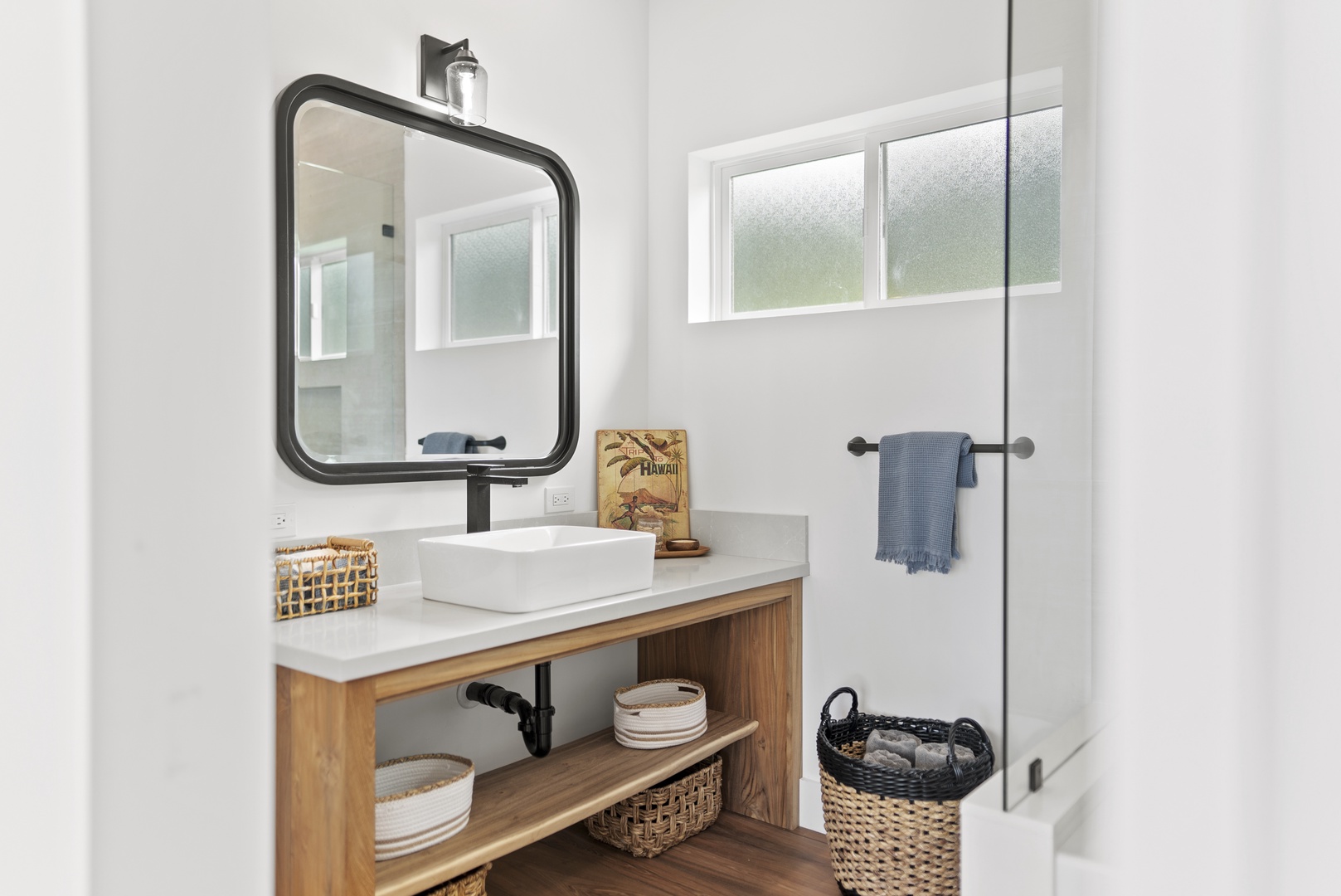 Haleiwa Vacation Rentals, Villa Bianca - Ensuite bathroom with a chic vanity area, ideal for getting ready in style.