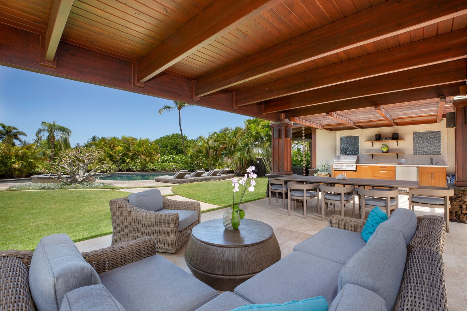 Kamuela Vacation Rentals, Beach Walker at Champion Ridge - Cozy outdoor lounge framed by warm wood beams and garden views.