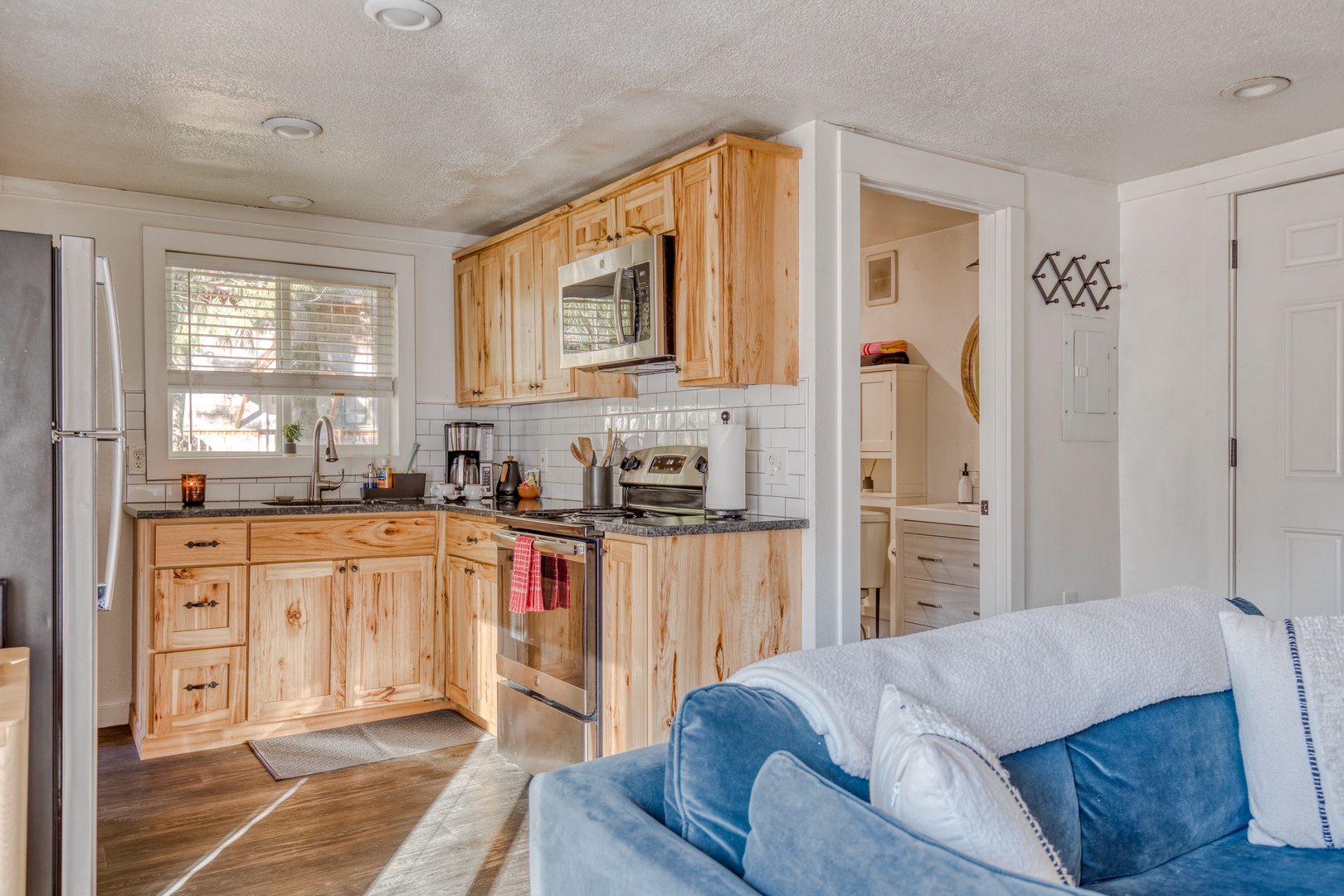 Rhododendron Vacation Rentals, Riverbend Cabin #1 - Kitchen and living room