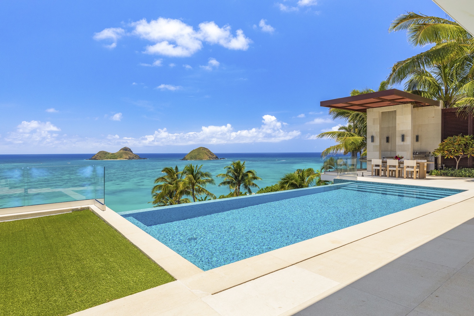 Kailua Vacation Rentals, Lanikai Hillside Estate - Pool deck and lanai with panoramic ocean views, ideal for soaking up the Hawaiian sun.