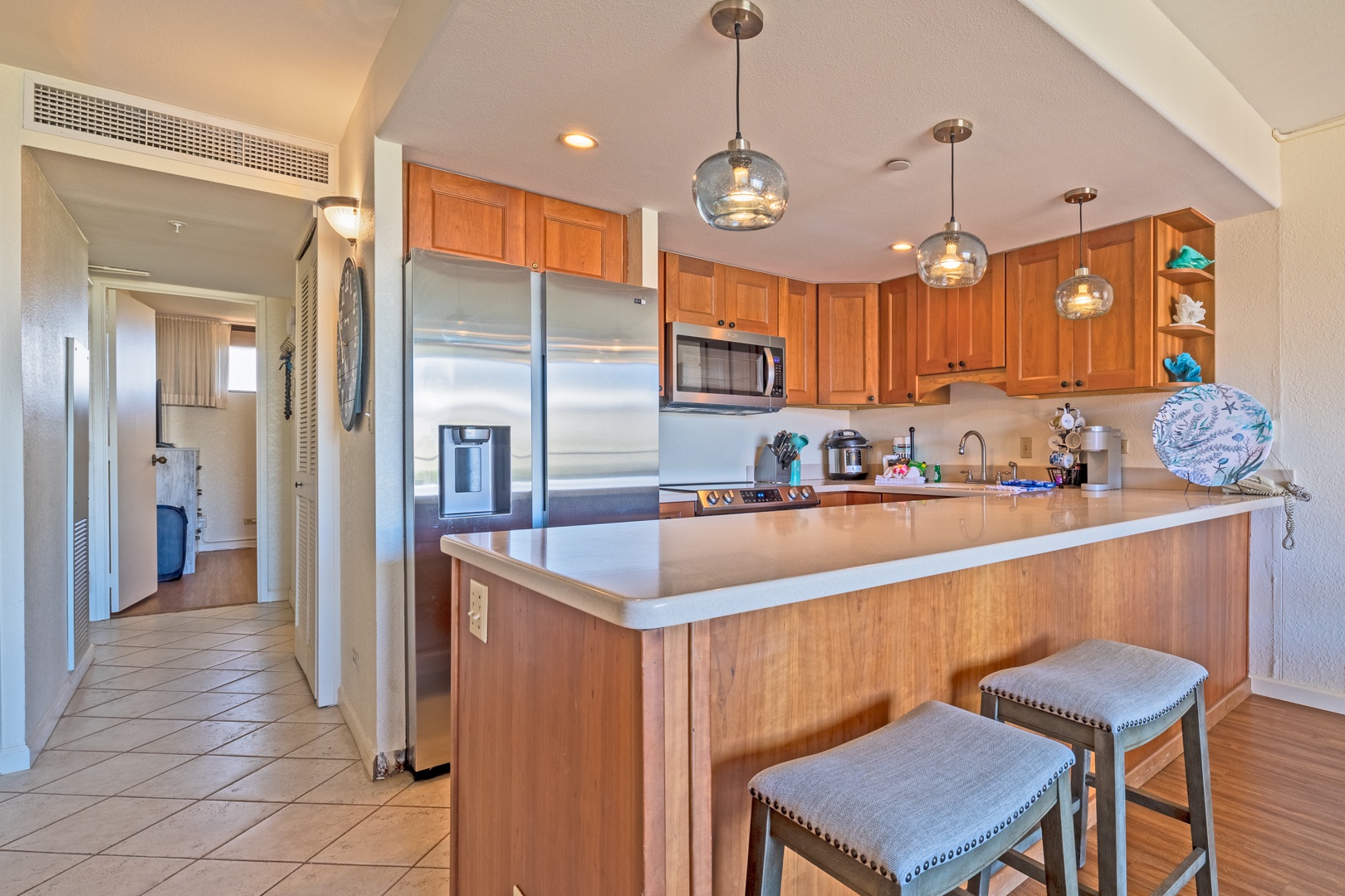 Lahaina Vacation Rentals, Kaanapali Shores 746 - The kitchen is equipped with stainless steel appliances and offers plenty of counter space, ideal for meal preparation.