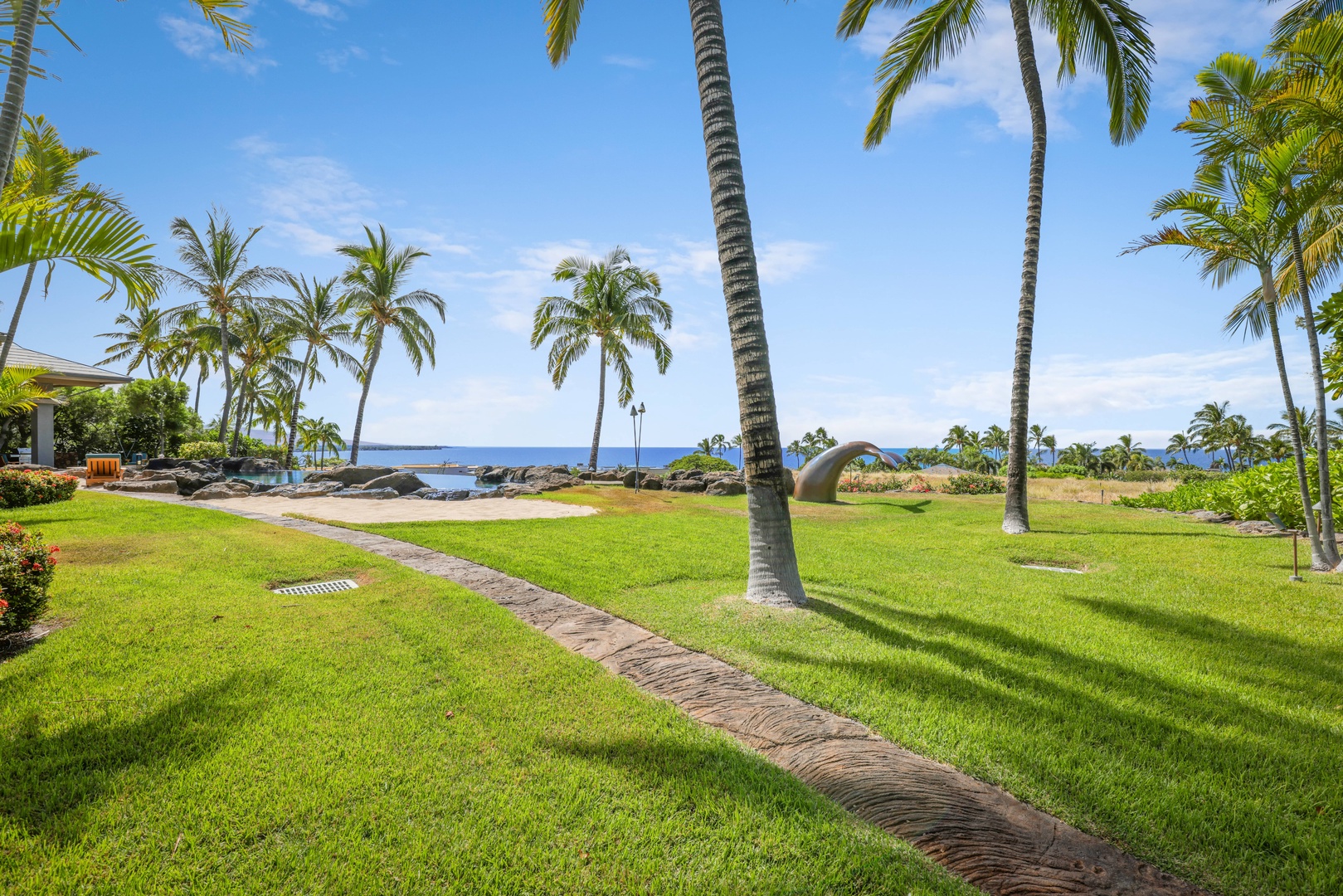 Kamuela Vacation Rentals, Mauna Kea Resort Bluffs 22 - The Beach House - Take a stroll on the serene and expansive backyard with swaying palms and peaceful ocean views.