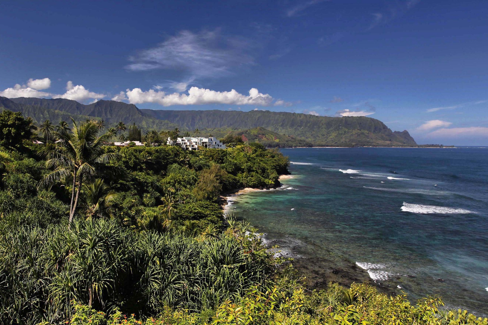 Koloa Vacation Rentals, Pili Mai 14K - Stunning coastal view with lush greenery and blue ocean waters.