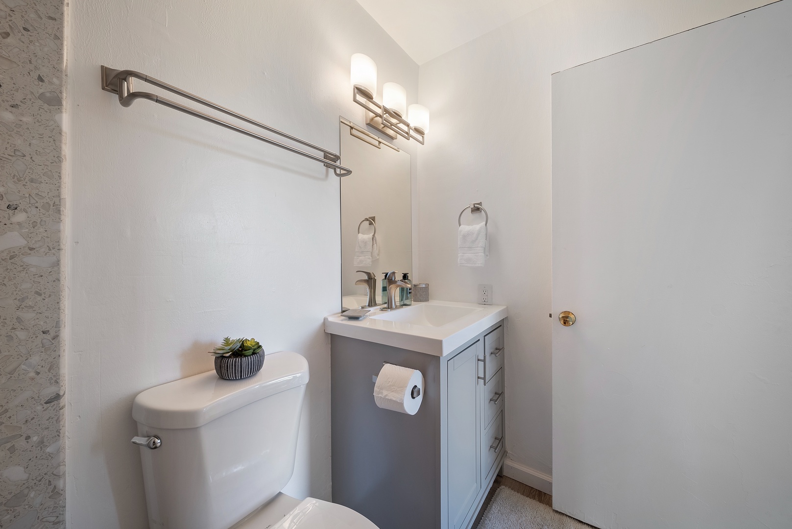 Kahuku Vacation Rentals, Kuilima Estates West #85 - Downstairs Ensuite bathroom with main bedroom.