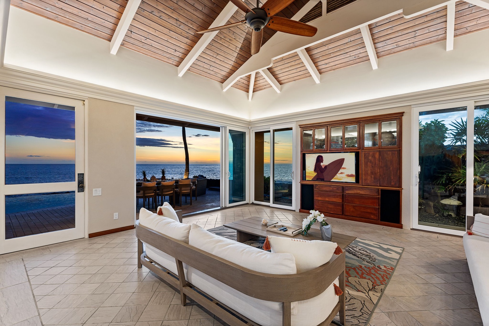 Kailua Kona Vacation Rentals, Ali'i Point #9 - Restoration hardware furnishings throughout the downstairs next to a beautiful sunset