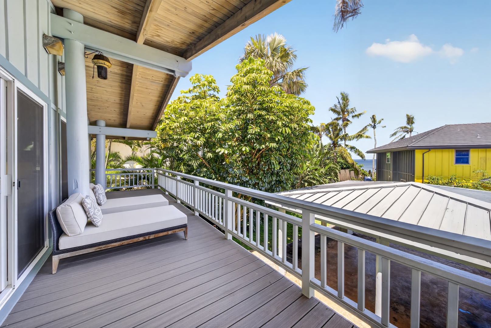 Haleiwa Vacation Rentals, Sunset Beach Hideaway - Lounge on your covered lanai and unwind with peaceful garden and partial ocean views.