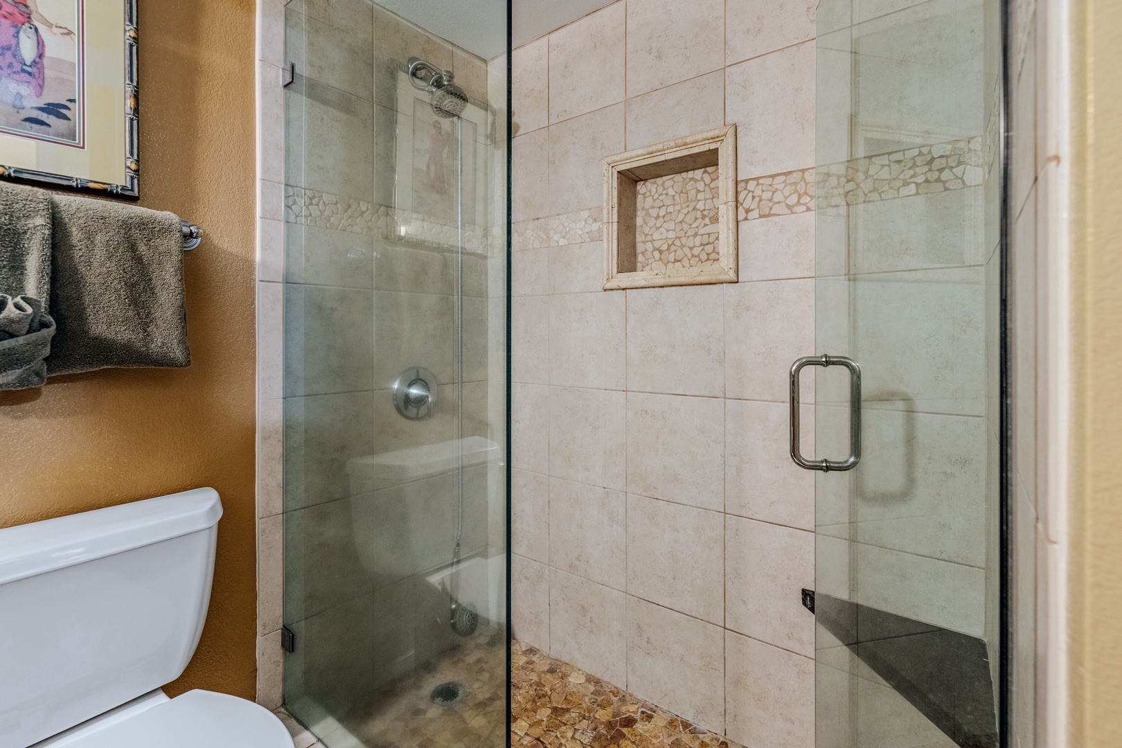 Kihei Vacation Rentals, Kamaole Sands 5310 - A tiled niche built into the shower wall keeps shampoo and soap within reach, no caddy required.