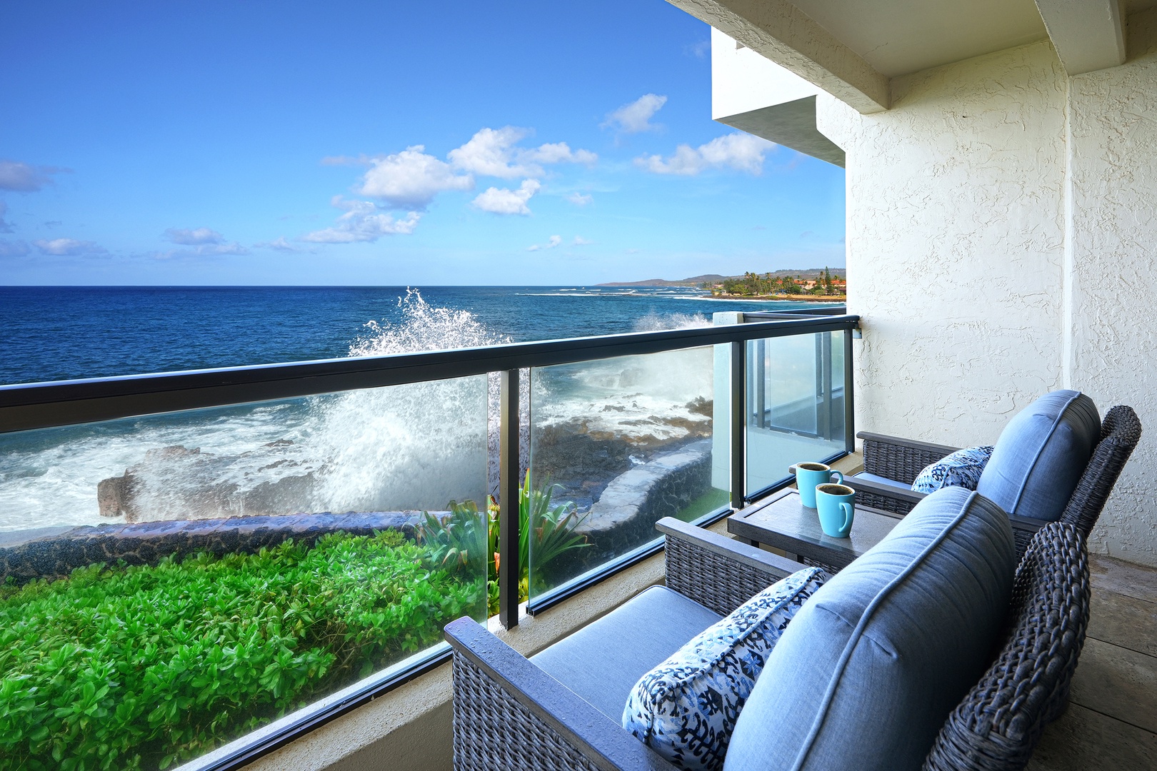 Koloa Vacation Rentals, Poipu Shores A206 - Experience the Majestic Symphony of Waves Crashing against the Cliffs, Right from Your Lanai!