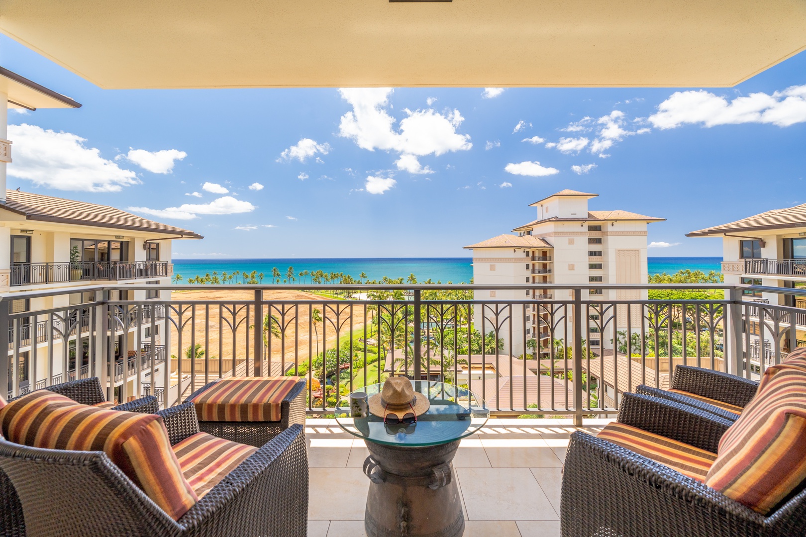 Kapolei Vacation Rentals, Ko Olina Beach Villas O904 - Dine on the lanai with panoramic views of the island and sea.