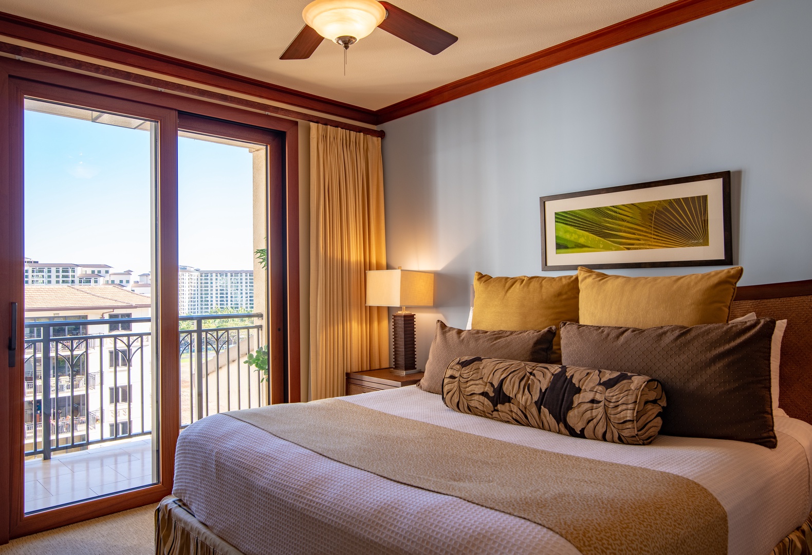 Kapolei Vacation Rentals, Ko Olina Beach Villas O1011 - The primary guest bedroom with lanai access.