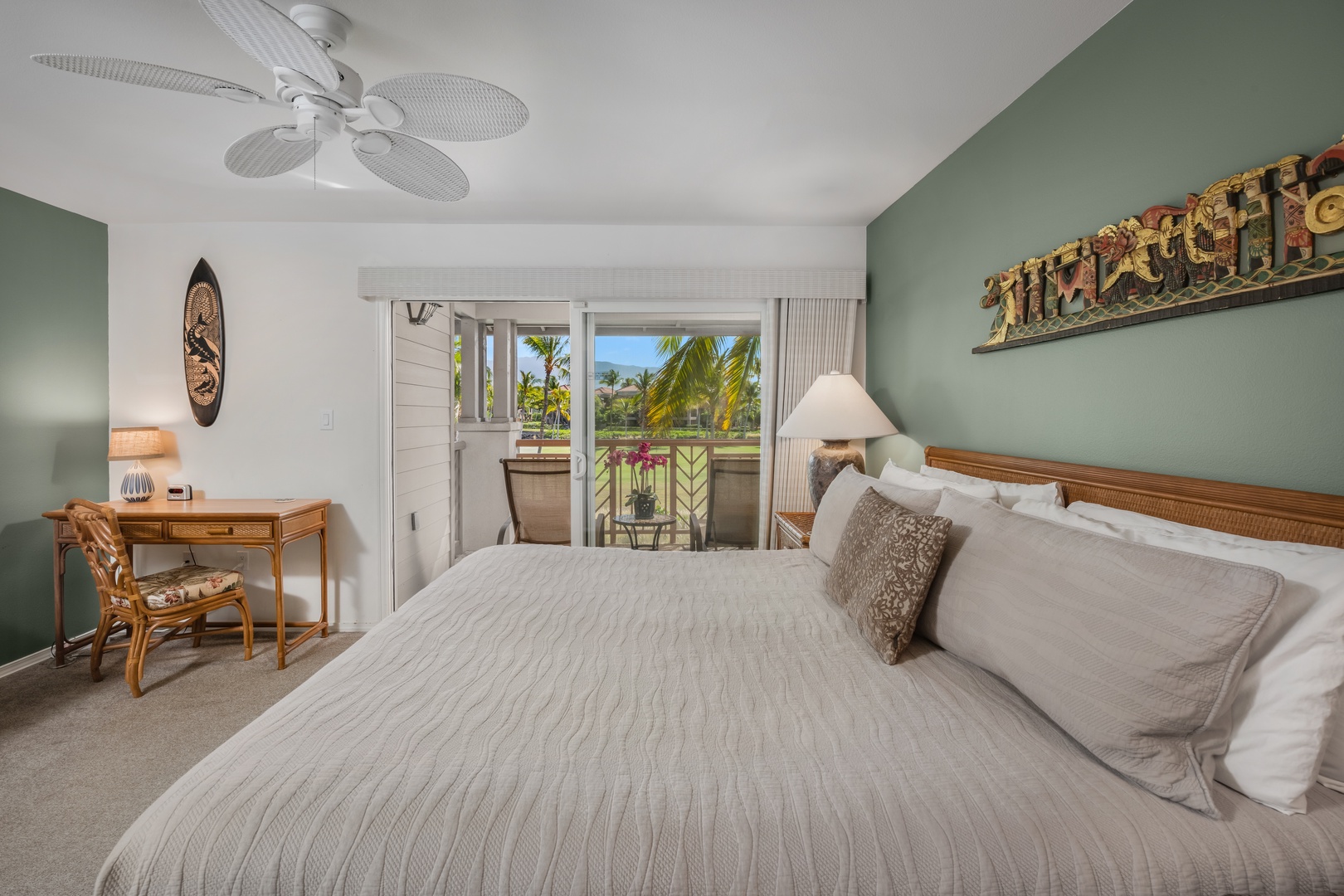 Waikoloa Vacation Rentals, Waikoloa Colony Villas 403 - Primary Bedroom w King Size Bed, Private Lanai w Loungers ,and Ensuite Bath.