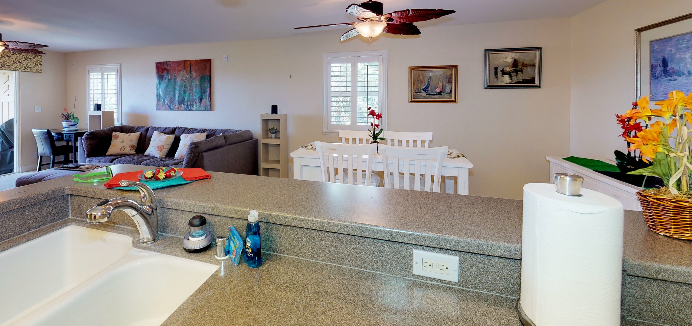 Kapolei Vacation Rentals, Ko Olina Kai 1065E - The open floor plan includes kitchen, dining and living areas.