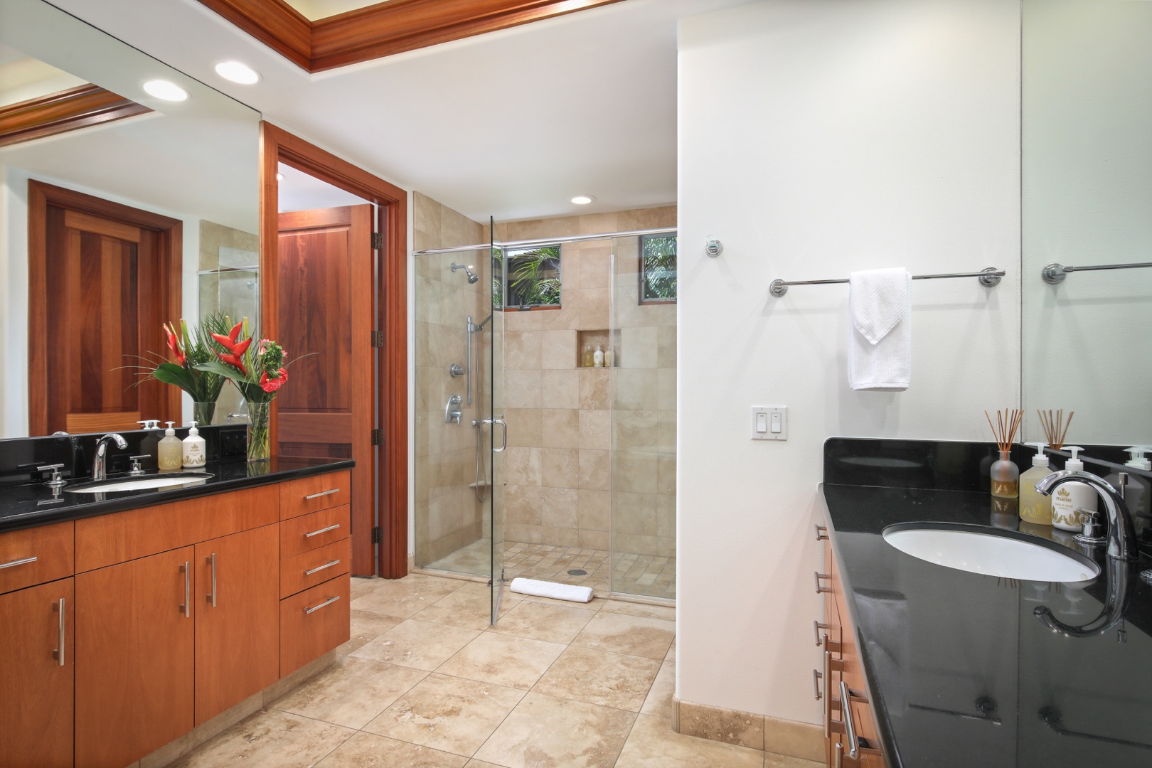 Kailua Kona Vacation Rentals, 4BD Pakui Street (147) Estate Home at Four Seasons Resort at Hualalai - Primary ensuite bath with dual sinks, large glass enclosed shower private W/C and soaking tub.