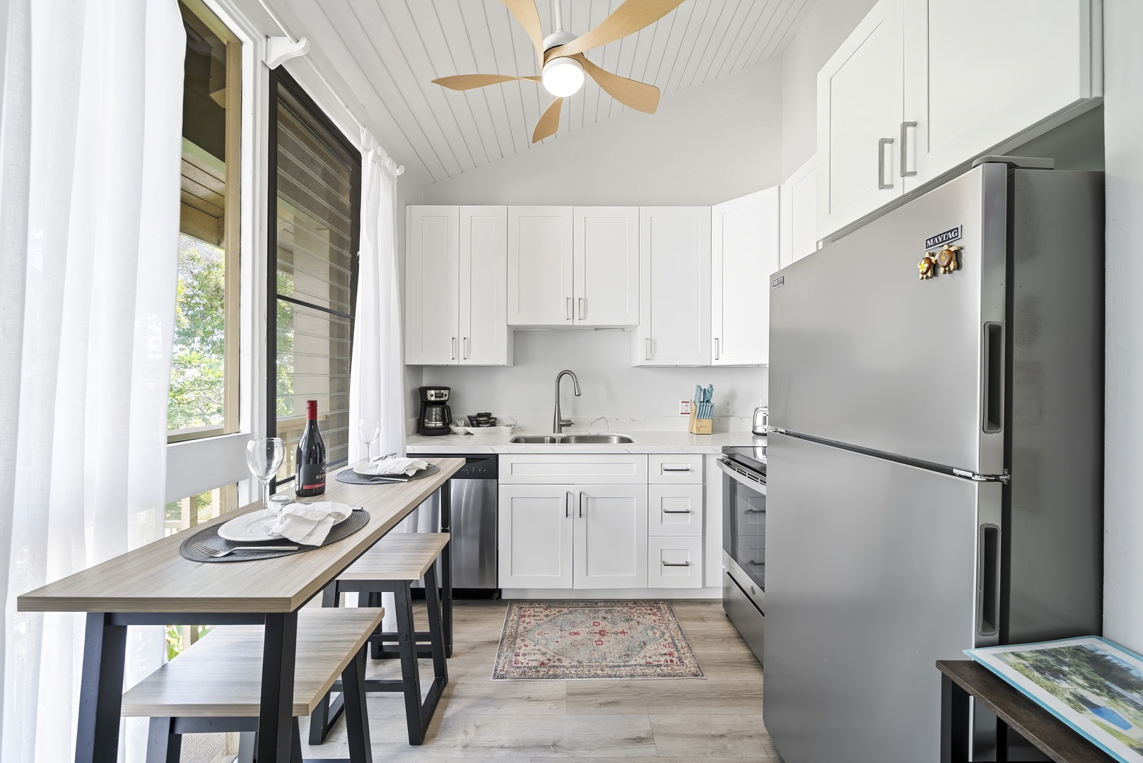 Kahuku Vacation Rentals, Kuilima Estates West #132 - The galley kitchen keeps everything within reach, from the stove to the breakfast counter.