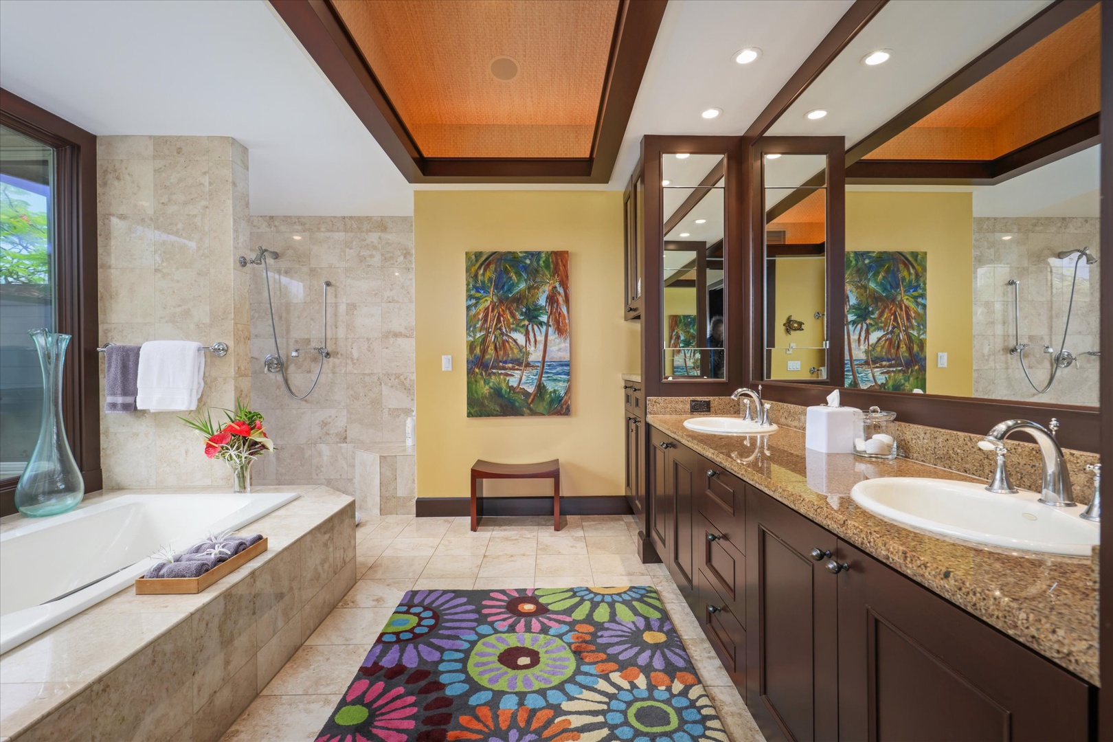 Kailua Kona Vacation Rentals, Wai'ulu Villa 115D - Primary bathroom with soaking tub, dual vanities, and walk-in shower—resort-style pampering at home.