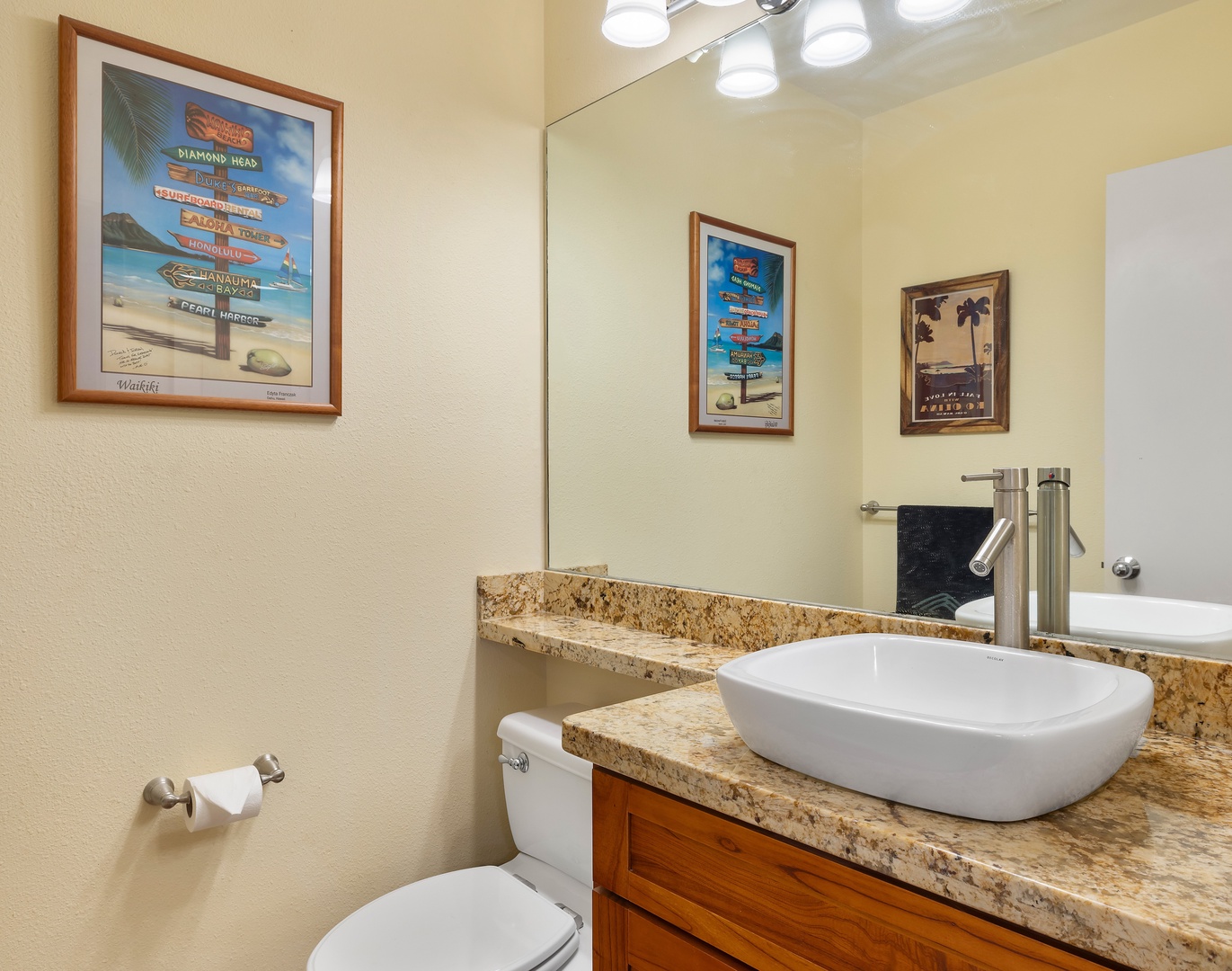 Kapolei Vacation Rentals, Fairways at Ko Olina 24H - A well-appointed bathroom with a vessel sink and granite countertops for a modern touch.