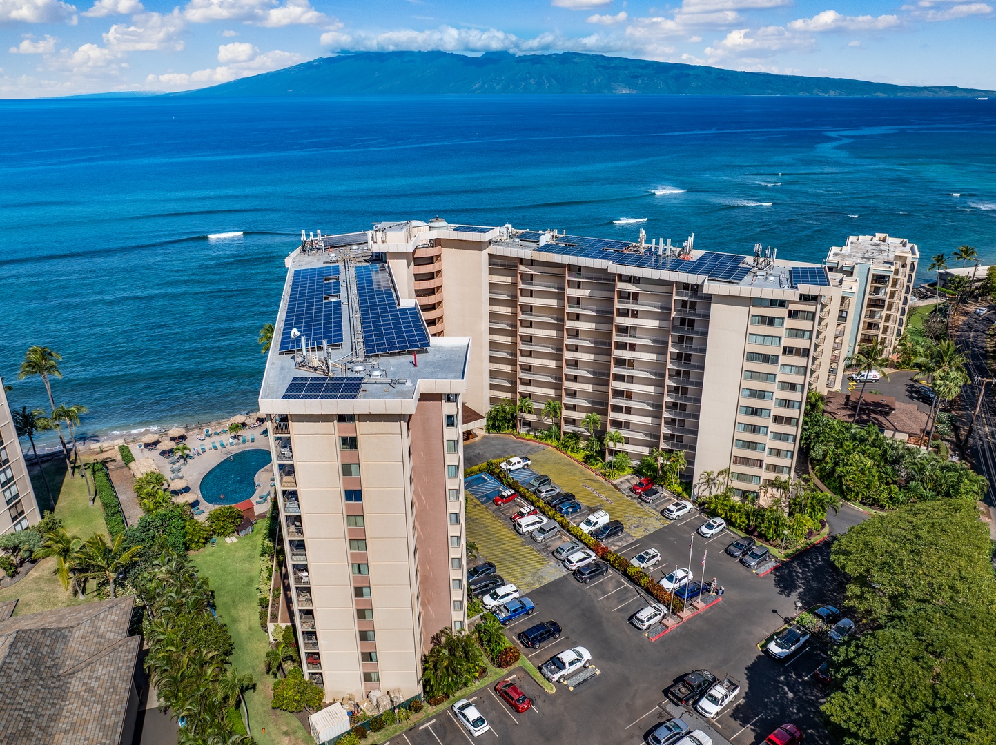 Lahaina Vacation Rentals, Royal Kahana 213 - Aerial view of Royal Kahana 213 with Moloka‘i in the distance and endless ocean beyond.