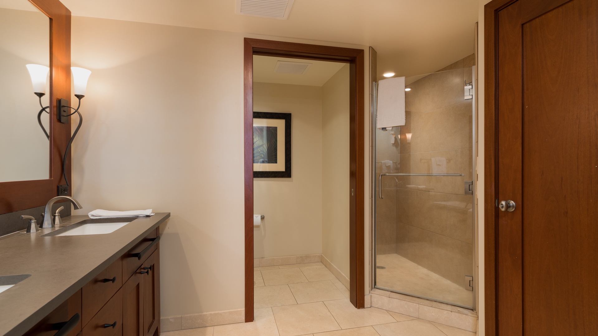 Kapolei Vacation Rentals, Ko Olina Beach Villas B310 - The primary guest bathroom features a walk-in shower and soaking tub.