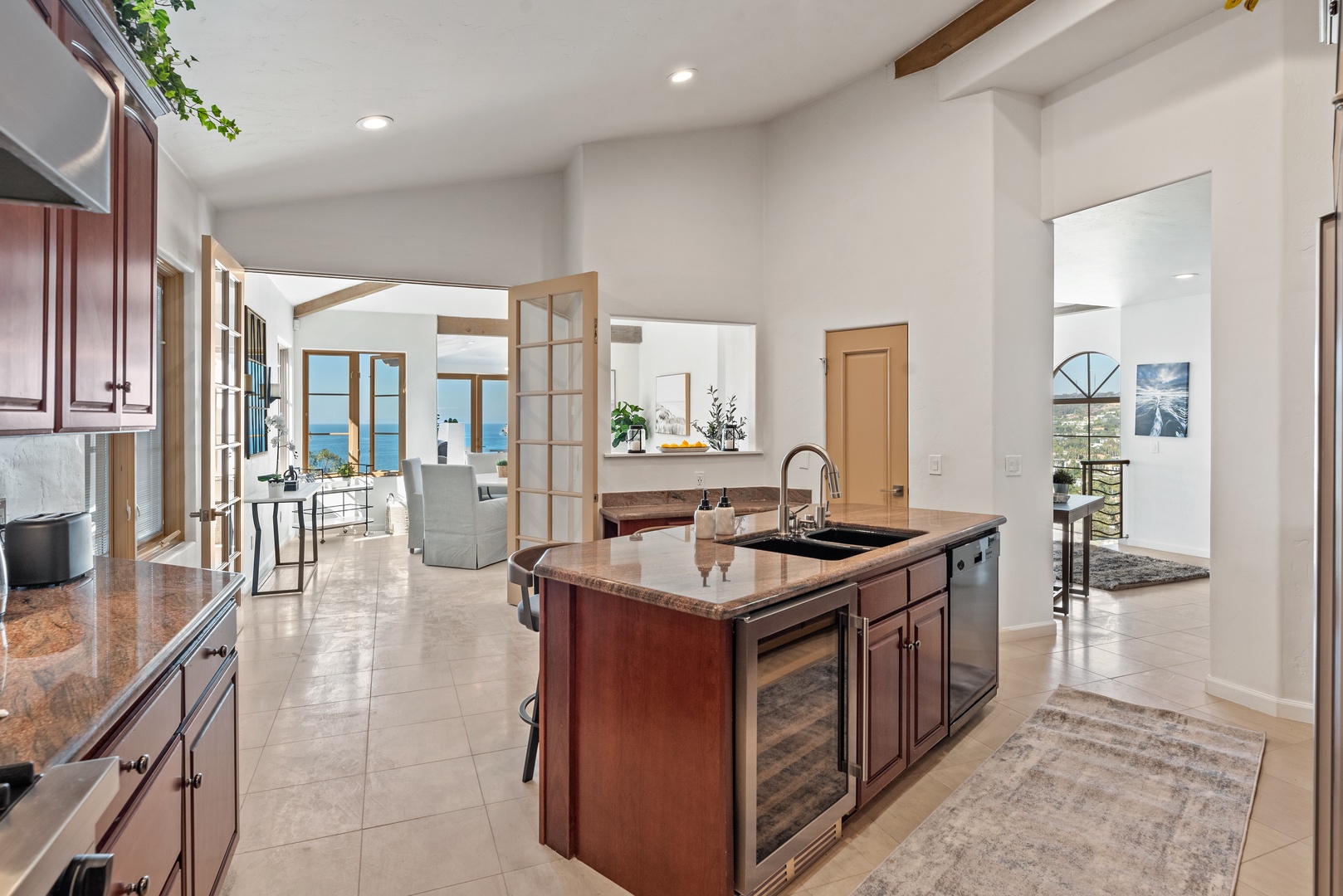 La Jolla Vacation Rentals, Coastal Lookout - The open floor plan and functionality of this home will impress every chef.  Wine cooler and dishwasher in the island for perfect service.