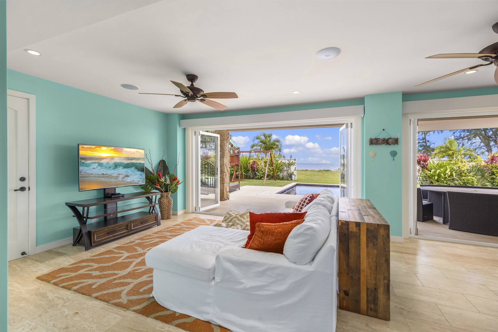 Waialua Vacation Rentals, Waialua Beachfront Getaway - Another large television in the first-floor media area.