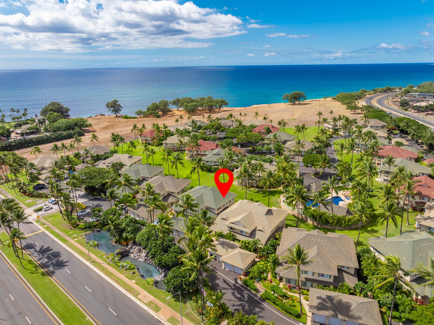 Kapolei Vacation Rentals, Kai Lani Luxury 6D - Aerial view highlighting the prime location of Kai Lani Luxury 6D, just steps away from the stunning Hawaiian coastline.