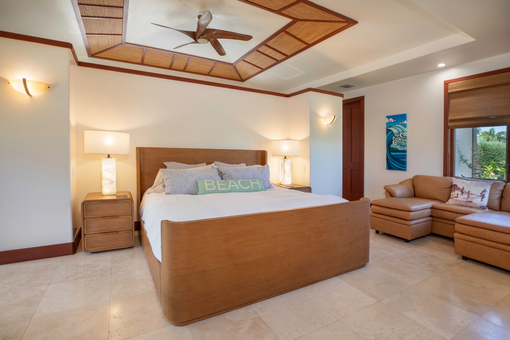Kamuela Vacation Rentals, Canoe House & Beach Walker at Champion Ridge - Rest easy in a king suite with ceiling fan, cozy lighting, and peaceful vibes.