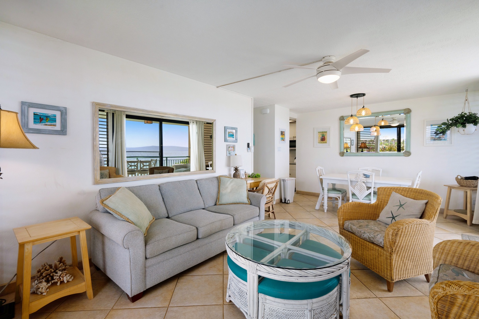 Kihei Vacation Rentals, Punahoa Beach 205 - Claim the long sofa for an afternoon nap while daylight pours in through the wide window.