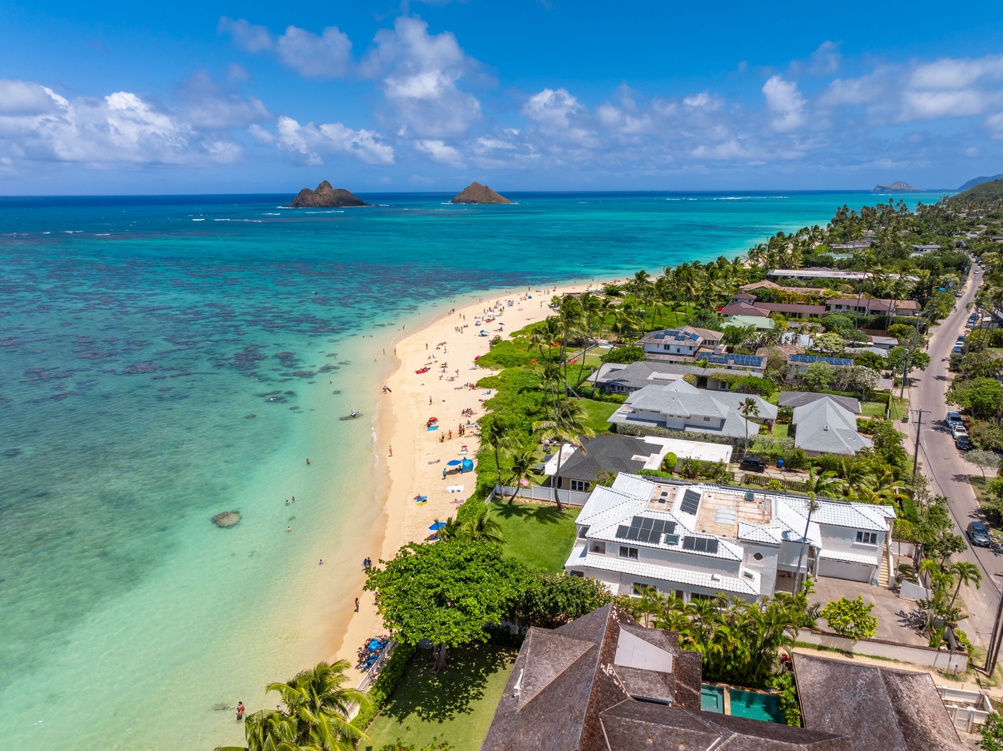 Kailua Vacation Rentals, Lanikai Sunrise Estate - This stunning drone view highlights your direct access to world-famous Lanikai Beach.