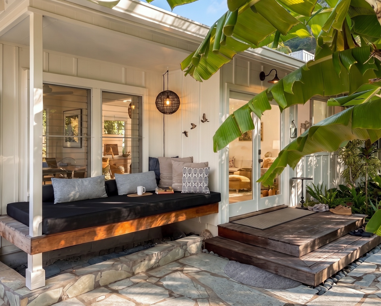 Kailua Vacation Rentals, Lanikai Ola Nani - A cushioned daybed tucked under the eaves, where the banana leaves rustle overhead and the afternoon nap becomes a ritual.