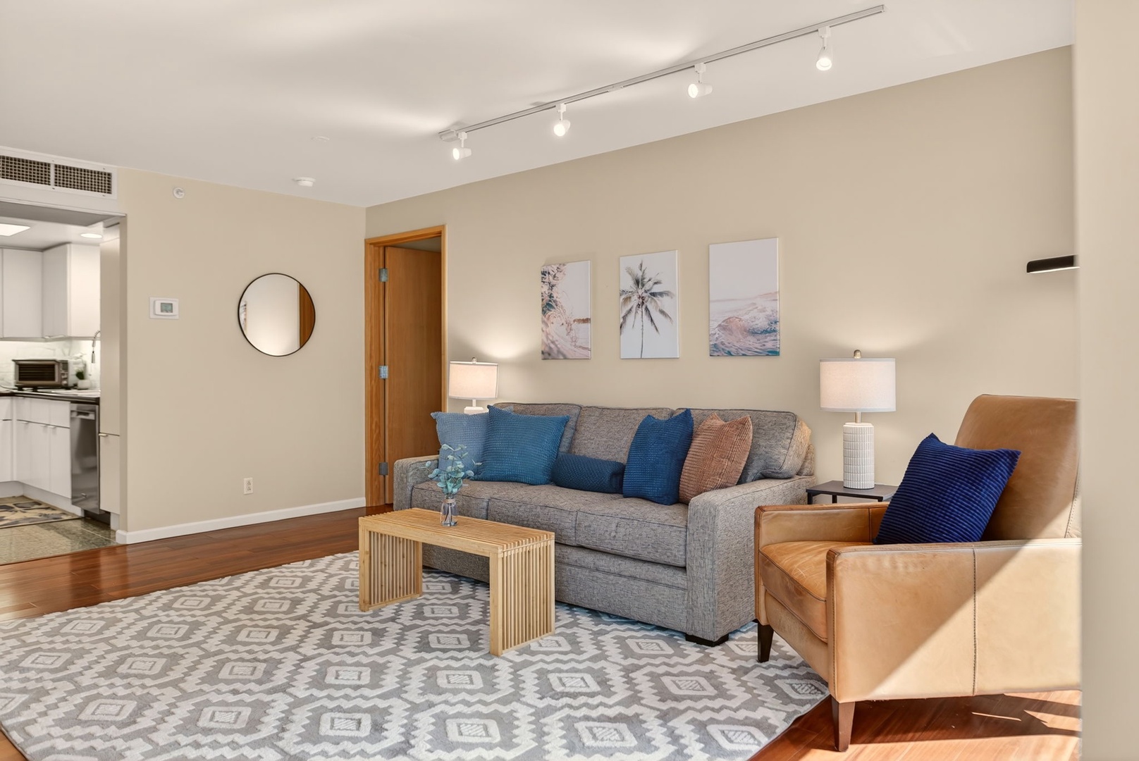 Honolulu Vacation Rentals, Island View at Waikiki Landmark - Lounge comfortably in the open living room with cozy seating and island-inspired décor.