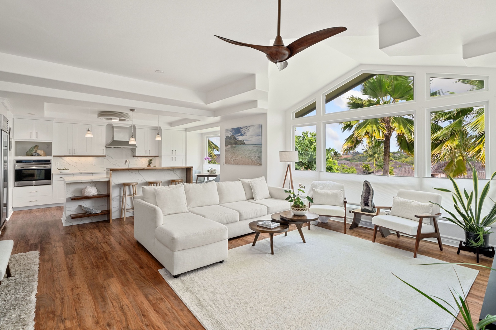 Princeville Vacation Rentals, Tropical Elegance - Spacious living area with tropical views; a true relaxation haven.