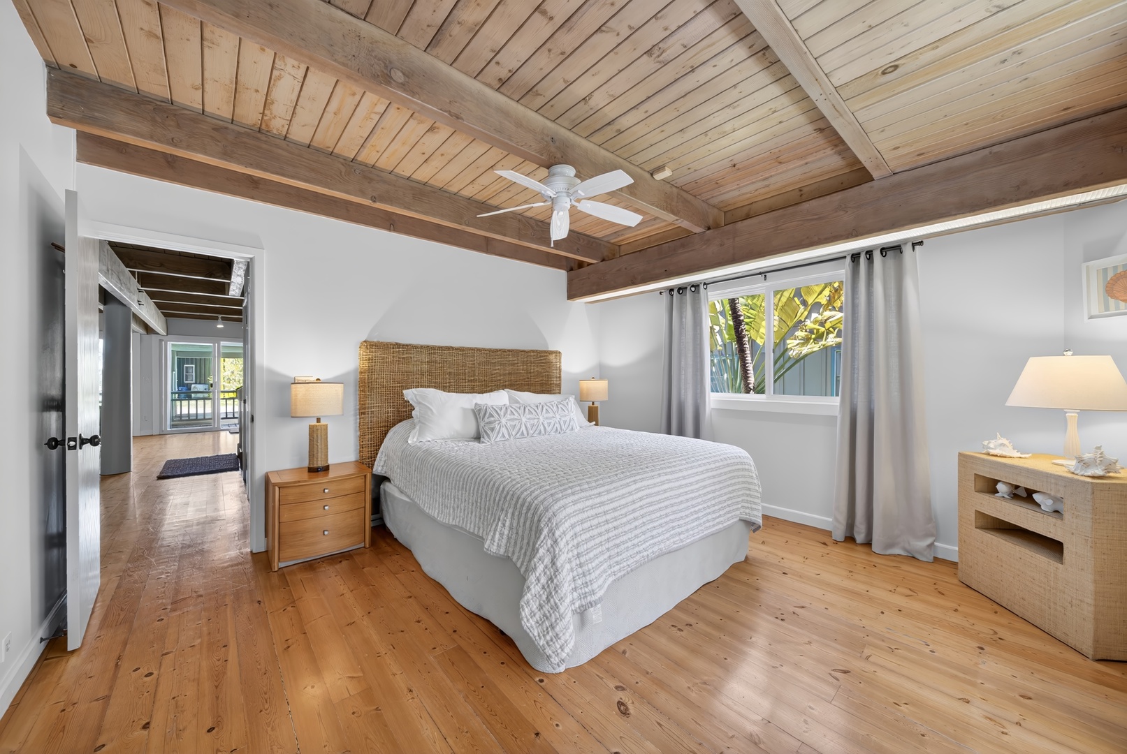 Haleiwa Vacation Rentals, Sunset Beach Hideaway - Recharge in the airy bedroom with Cal king bed, high ceilings and relaxed coastal-inspired touches.